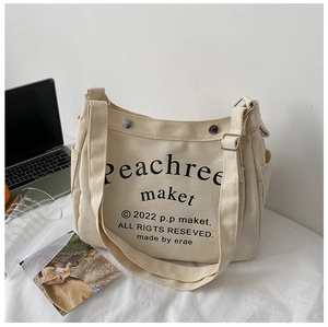 Minimalist beige canvas crossbody bag with large capacity and adjustable wide strap