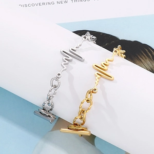Minimalist heartbeat pattern bracelet with OT toggle clasp in gold and silver finish