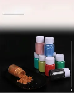Detailed macro shot of shimmering pearlescent mica powder bottles for DIY resin craft sets