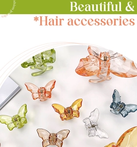 Detailed view of colorful translucent butterfly hair claws with durable metal springs