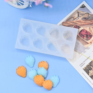 Detailed view of 8-cavity strawberry silicone mold for fondant cake and chocolate baking
