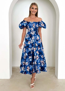 Detailed view of off-shoulder floral midi dress with layered tiered skirt and puff sleeves