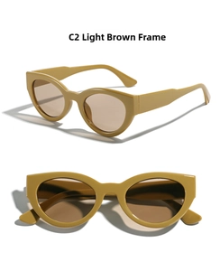 Detailed view of vintage cat-eye sunglasses with thick brown resin frames and tinted lenses