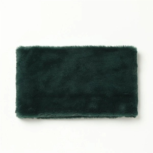 Detailed texture of thick dark green faux rabbit fur neck warmer scarf for winter