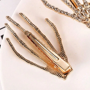 Barrettes à cheveux gothiques main de squelette dorée avec strass pour Halloween
