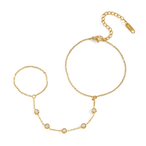 Elegant 18K gold plated stainless steel finger bracelet with five sparkling crystal zircons