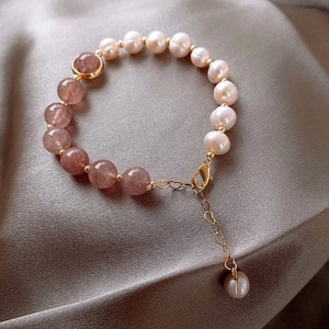 Elegant strawberry crystal pearl beaded bracelet with a gold heart adjustable chain