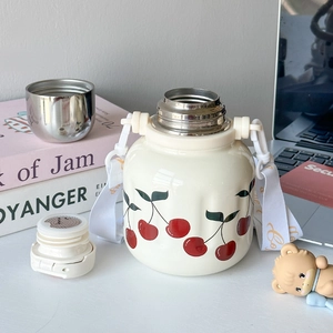 Detail of a white cherry print thermos with high-quality 316 stainless steel finish
