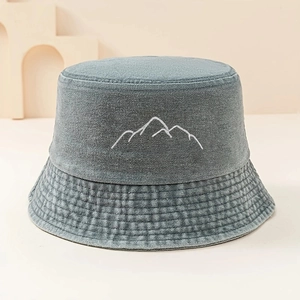 Unisex washed blue denim bucket hat featuring white mountain embroidery for outdoor casual style