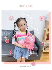 Pink mini backpack for girls with sequined cat ears, pearl handle, and glitter bow detail