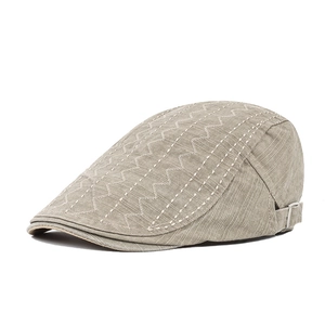 Grey cotton flat cap with white wavy embroidery and adjustable silver buckle