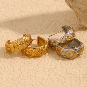 18K gold plated celestial hoop earrings set with sun moon and star motifs and zircons