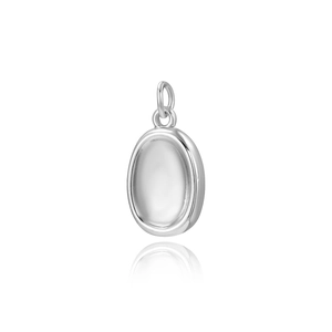 Detailed close-up of a silver oval pendant with a smooth finish and polished jump ring