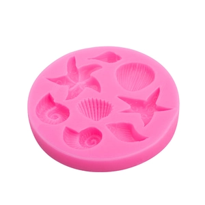 Pink silicone shell and starfish mold for ocean themed cake decoration and baking