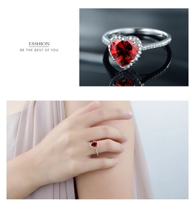 Macro detail and model view of S925 silver ring featuring a red heart zircon stone