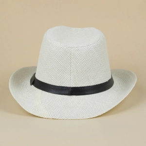 Close-up of breathable cream straw hat weave with black ribbon band detail