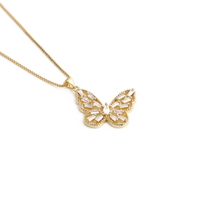 Minimalist gold butterfly necklace with sparkling crystals on a polished chain link