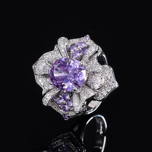 Elegant silver ring with a vintage floral design featuring purple and white zircons