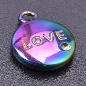 Macro view of rainbow plated stainless steel LOVE pendant with a clear zircon stone