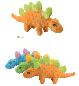 Detail of plush dinosaur dog toy with textured nubs for dental cleaning and play