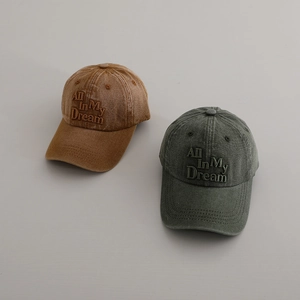 Vintage washed denim baseball caps in brown and grey with All In My Dream embroidery