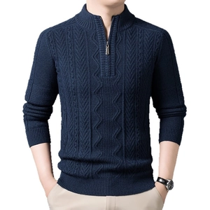 Men's navy blue quarter-zip cable knit sweater with stand collar and premium texture