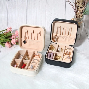 Mini portable PU leather jewelry box for rings and necklaces in beige and black