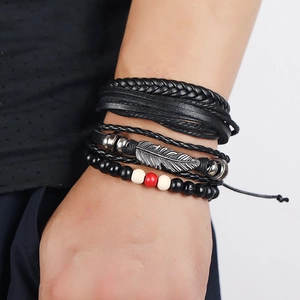 Men's bohemian layered bracelet set with black braided leather and silver feather charm