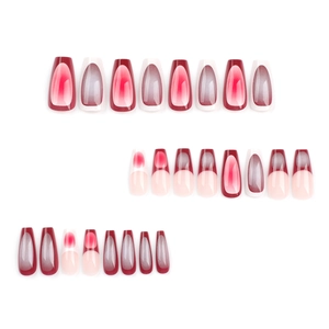 Long coffin press on nails featuring red French tips and gradient ombré cat eye design