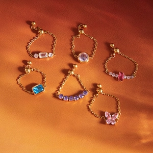 Adjustable gold-plated chain rings set with colorful zircon gemstones in various cuts