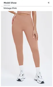 Close-up of high-waist seamless yoga pants in vintage pink color with knit texture