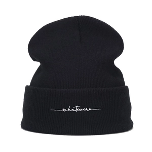 Fashionable black knit beanie with white whatever embroidery for outdoor warmth