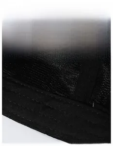 Macro view of breathable mesh lining and widened sweatband of the black camouflage cap