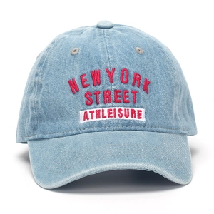Detail of red New York Street embroidery on light blue washed denim baseball cap