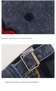 Close-up of washed baseball cap showing breathable eyelets and vintage metal buckle