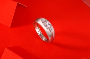 Macro shot of S925 silver ring with pink oval stone and engraved S925 hallmark