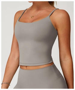 Detailed view of dark grey brushed yoga sports bra with thin straps and flat neckline