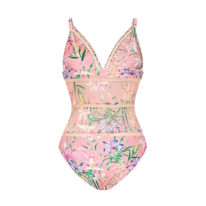 Detailed view of pink floral swimsuit featuring mesh cut-outs and lily flower print