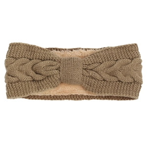 Detail of cable knit headband in dark coffee with thick warm fleece lining for winter