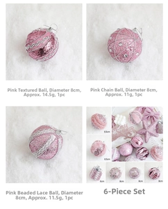 Detail of 8cm pink Christmas baubles with glitter texture and various decorative patterns