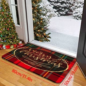 Close-up of a 80x50cm red plaid Merry Christmas doormat with festive gold lettering