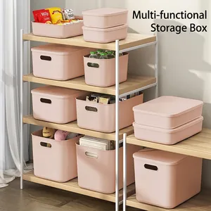 Pink stackable plastic storage bins with lids and side handles for home organization