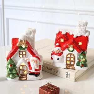 Lighted ceramic Christmas snow house ornaments with Santa and Snowman holiday decor