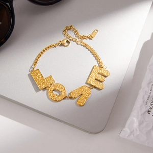 Golden stainless steel LOVE letter bracelet with hammered texture and adjustable chain