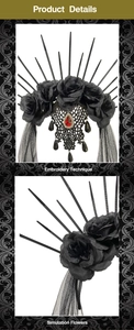 Detailed view of Gothic black roses and red gemstone embroidery on a bridal veil crown