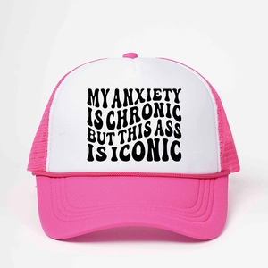 Pink and white trucker hat with MY ANXIETY IS CHRONIC BUT THIS ASS IS ICONIC text