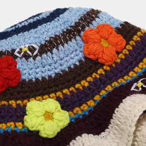 Handmade crochet bucket hat with colorful stripes and 3D floral accents for women