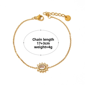 Detail of gold sunflower bracelet pendant with zircon stone and 17+3cm length mark