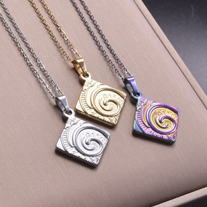 Detailed view of three square pendants in silver, gold, and rainbow finish for DIY necklaces
