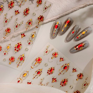 Retro palace style nail stickers with red gems and gold star patterns for manicure